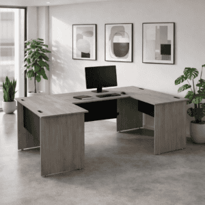 Escritorio de oficina moderno con plantas y arte abstracto en fondo blanco.
