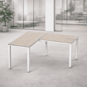 Escritorio de oficina en forma de L, ideal para espacios de trabajo colaborativos y oficinas moderna.