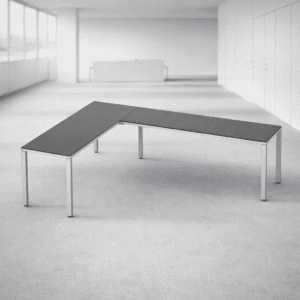 Mesa de oficina moderna y funcional en espacio minimalista.