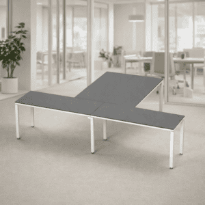 Mesa de oficina ajustable para trabajo y reuniones en espacio moderno.