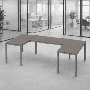 Mesa de oficina en forma de L para espacios de trabajo colaborativos y modernos.
