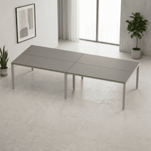 Mesa de oficina moderna y minimalista en espacio luminoso y elegante.