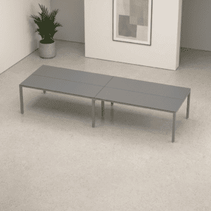 Mesa de oficina moderna y minimalista en color gris para espacios de trabajo elegantes.