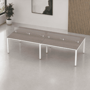 Mesa de oficina moderna con protección de acrílico para distanciamiento social.
