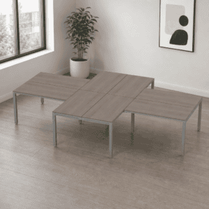 Mesa de oficina modular moderna y funcional en espacio de trabajo minimalista.