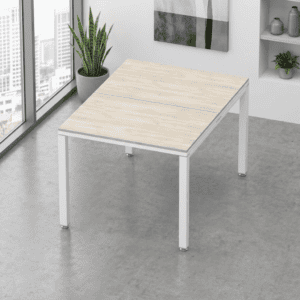 Mesa de oficina moderna con superficie de madera clara y estructura blanca en espacio de trabajo.